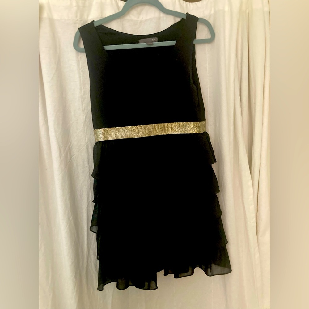 Stretchy tiered ruffle mini dress.